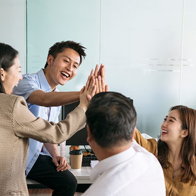 The staff all high-five each other